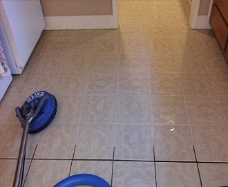 cleaning tiles and grout by machine