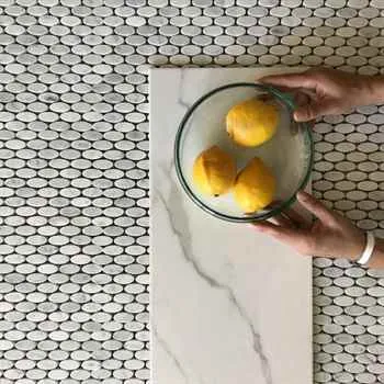 Bianco Carrara Oval Mosaic Polished White & Gray 12"x12" (5/8"x1-1/4" Chip Size)